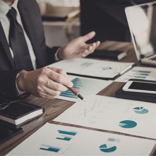 Gold Coast business owner reviewing email campaign analytics and performance data